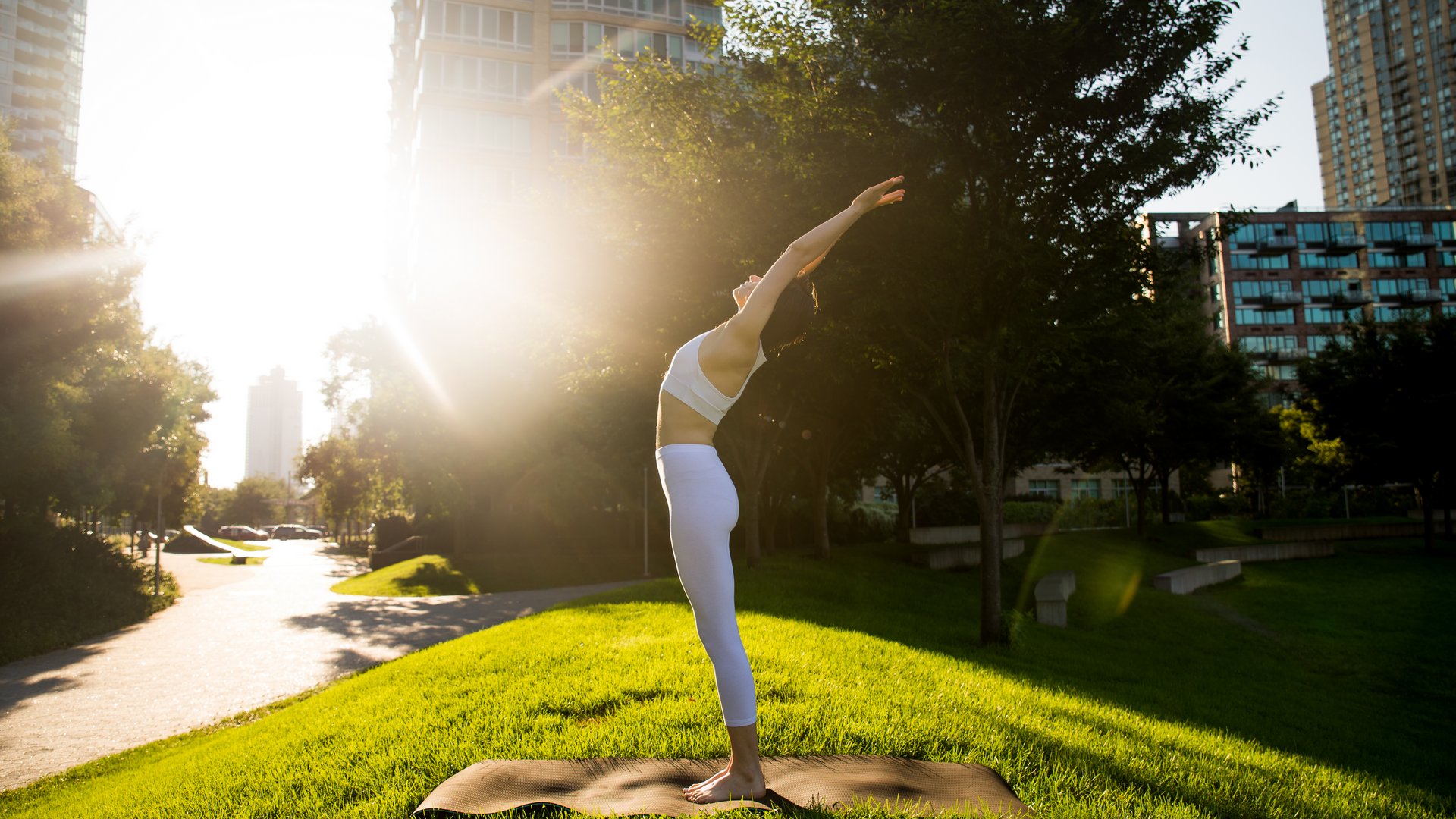woman-doing-yoga-in-a-park-2025-03-14-15-43-25-utc